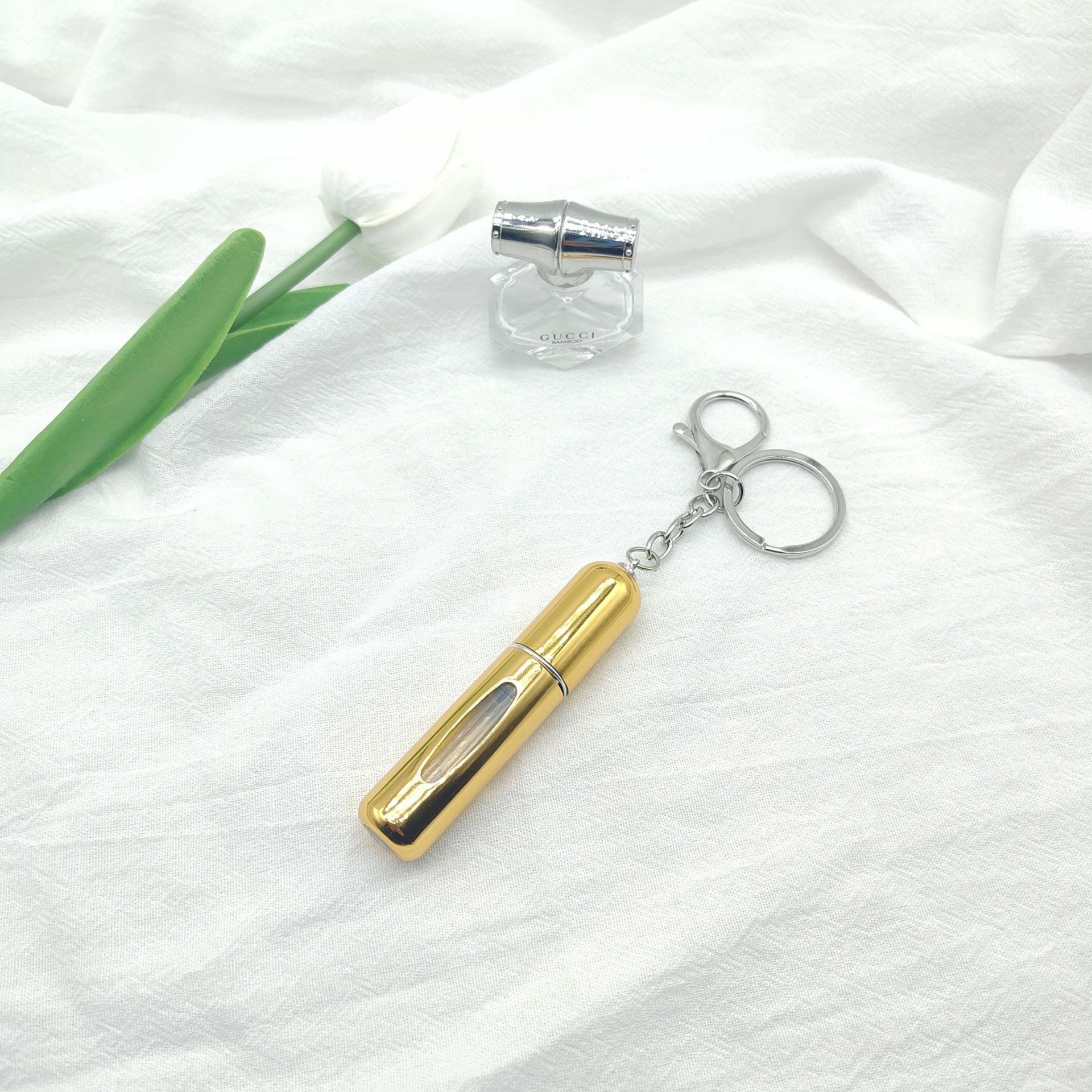 Wholesale bottom filling pump 5ml high color value sample key chain perfume bottle